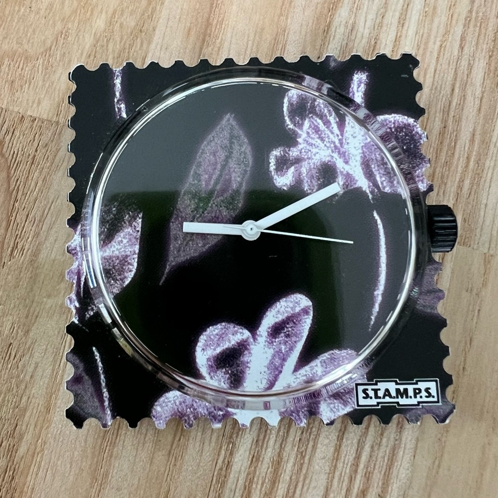S.T.A.M.P.S. Interchangeable watch face with purple and black floral design